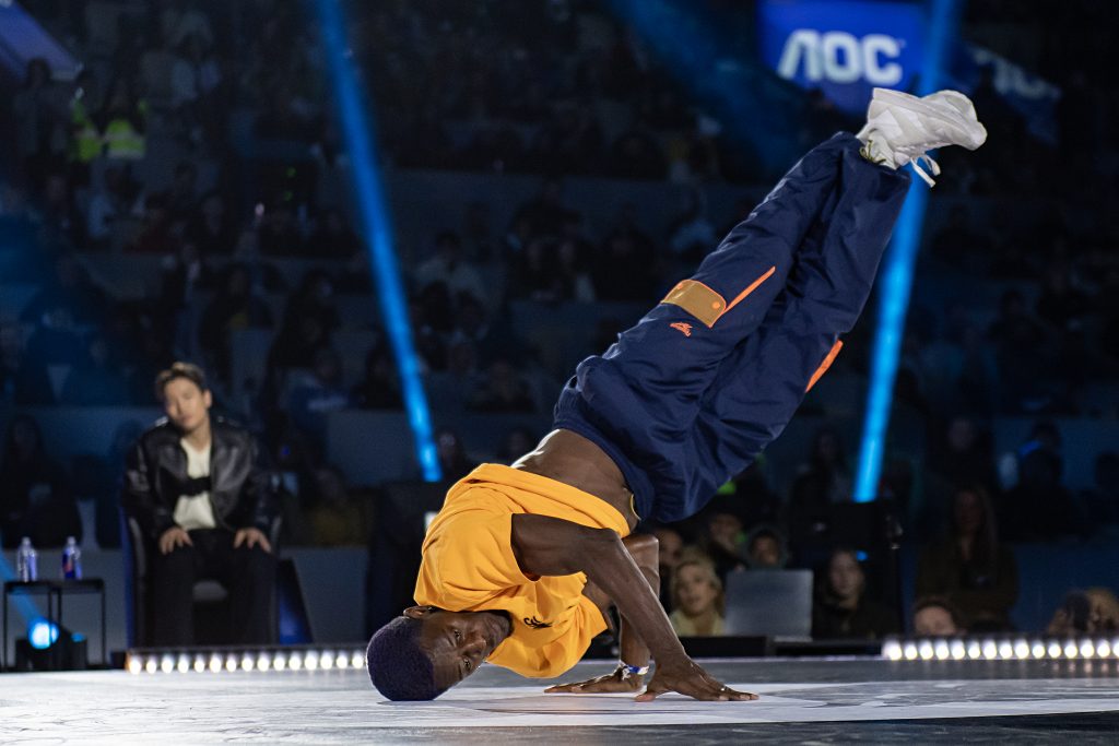 a breakdancer in motion during competion